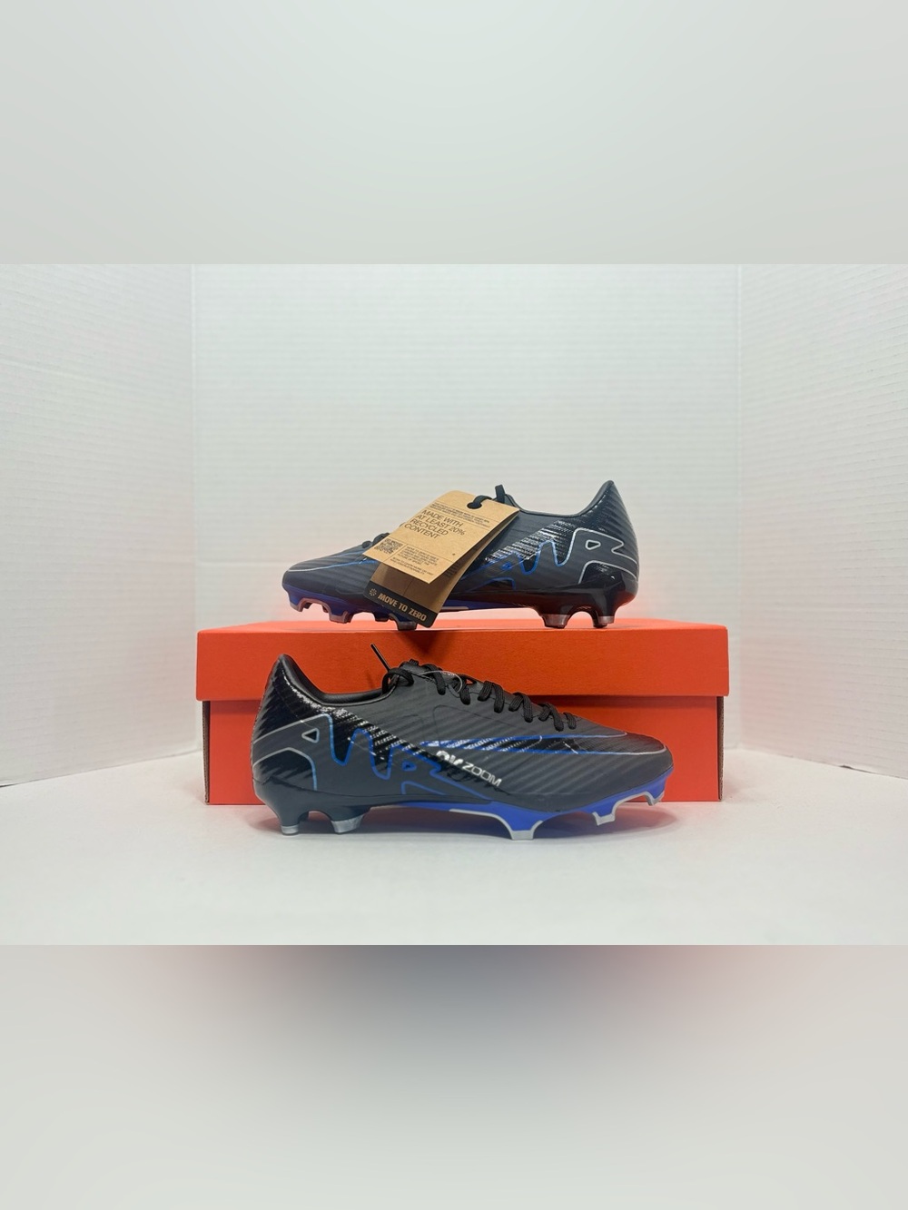 Nike Black Cleats with Blue Accents